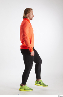 Erling  1 black pants dressed orange long sleeve t…